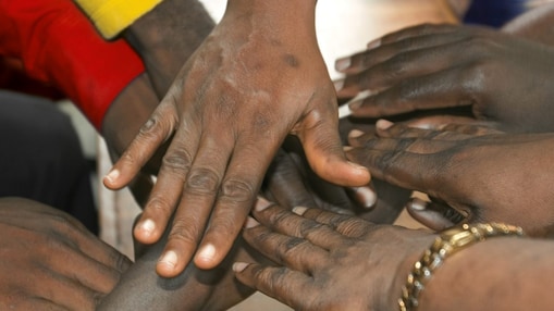 People joining their hands