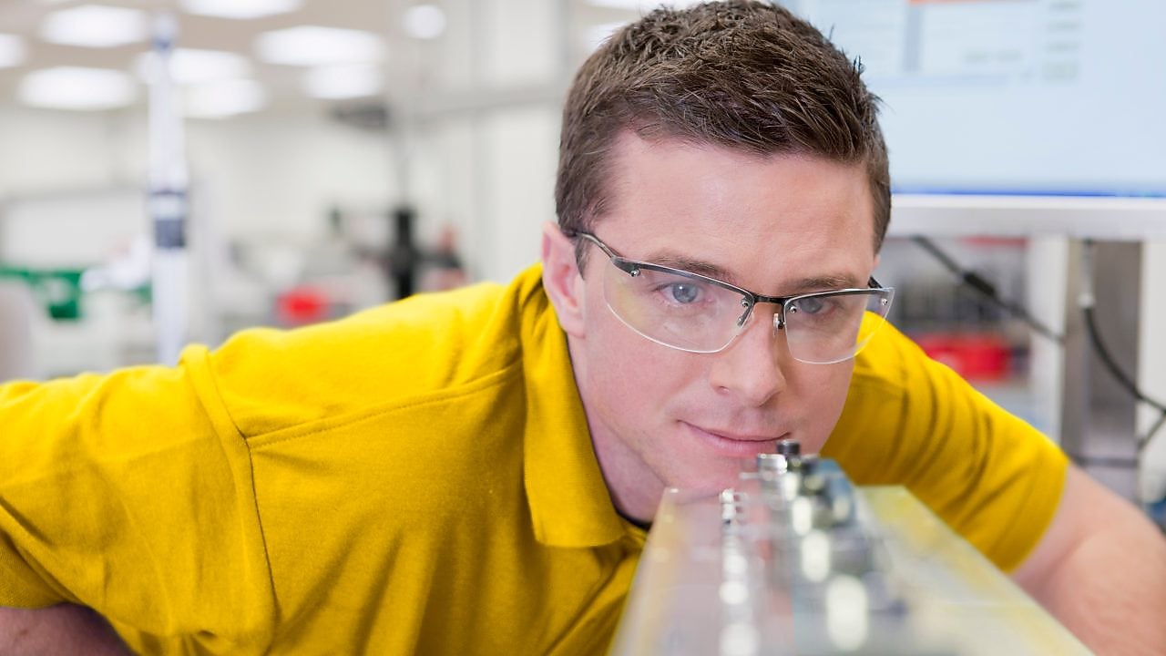 Man looking a instrument in the laboratory