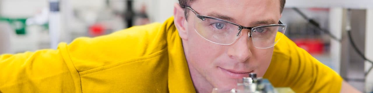 Man looking a instrument in the laboratory