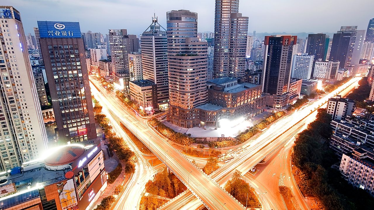 Downtown high rise towers lit up at twilight